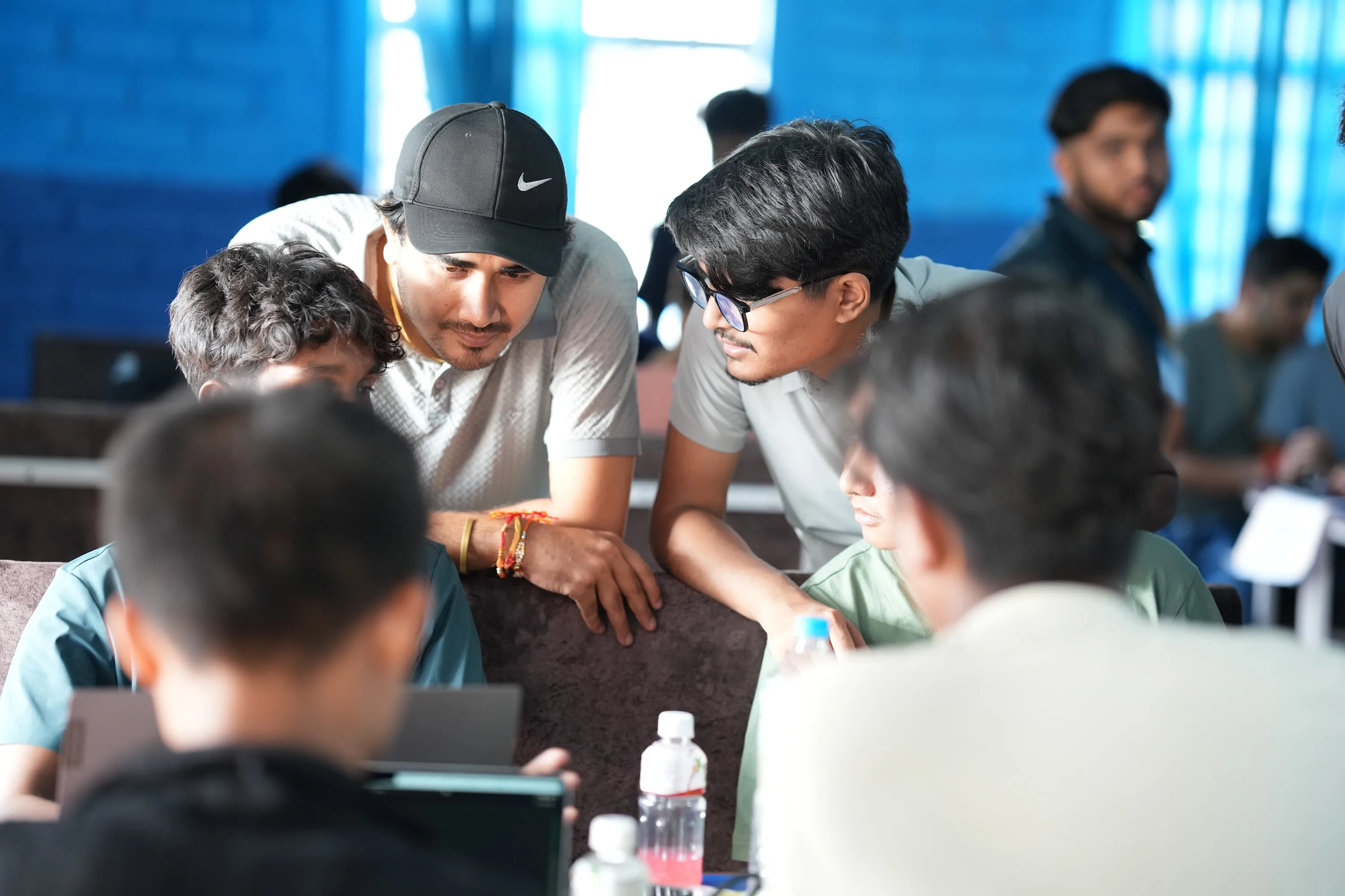 Mentors guiding participants